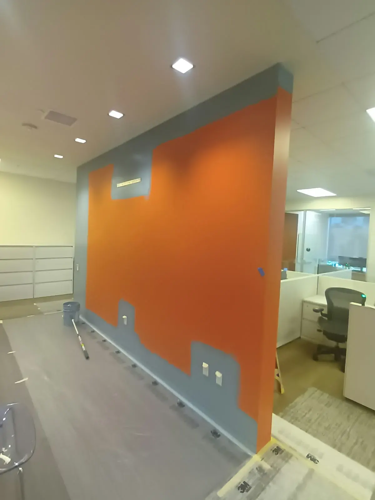 Commercial painting in San Jose, CA: office with an orange accent wall