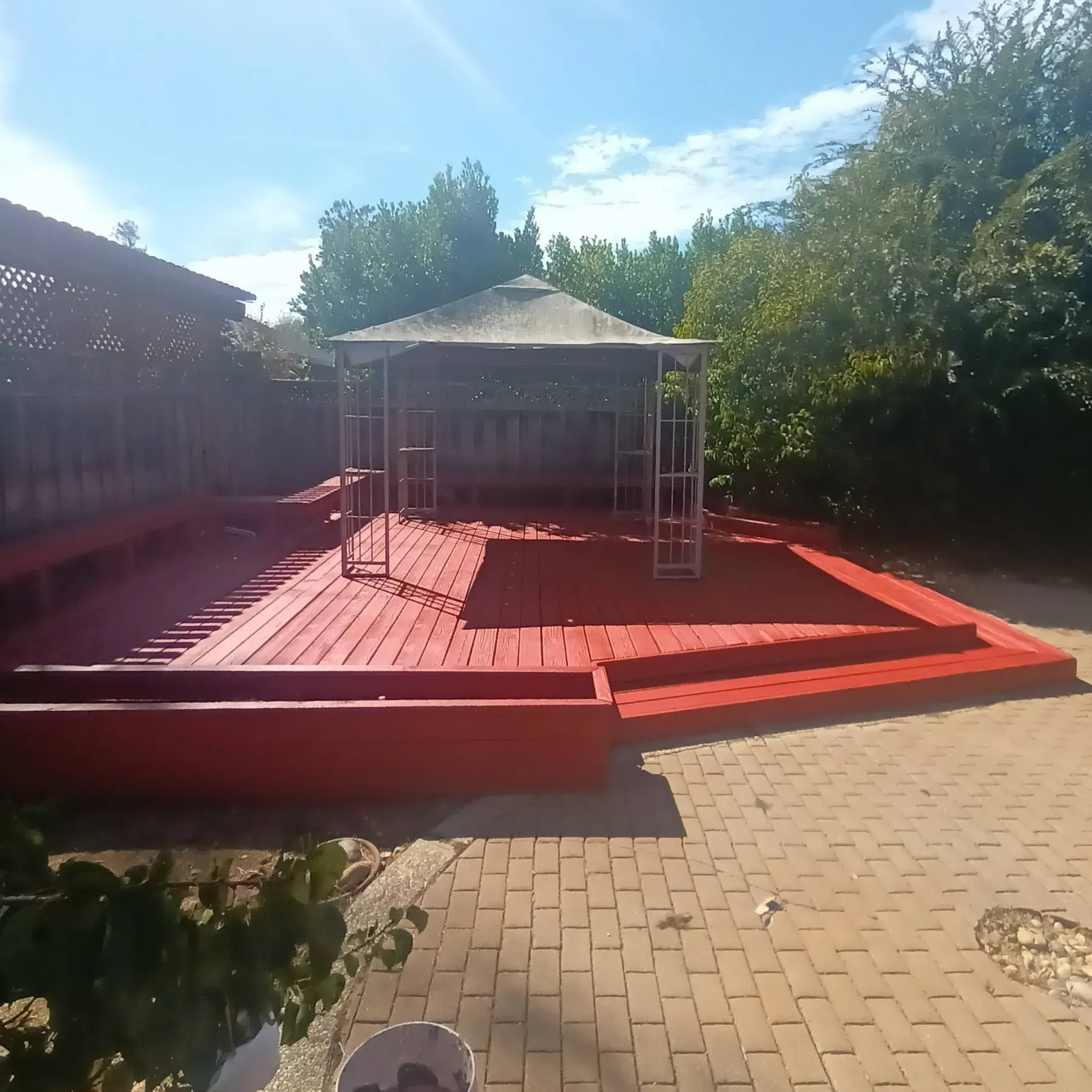 Deck painting in San Jose, CA: freshly painted red wood deck