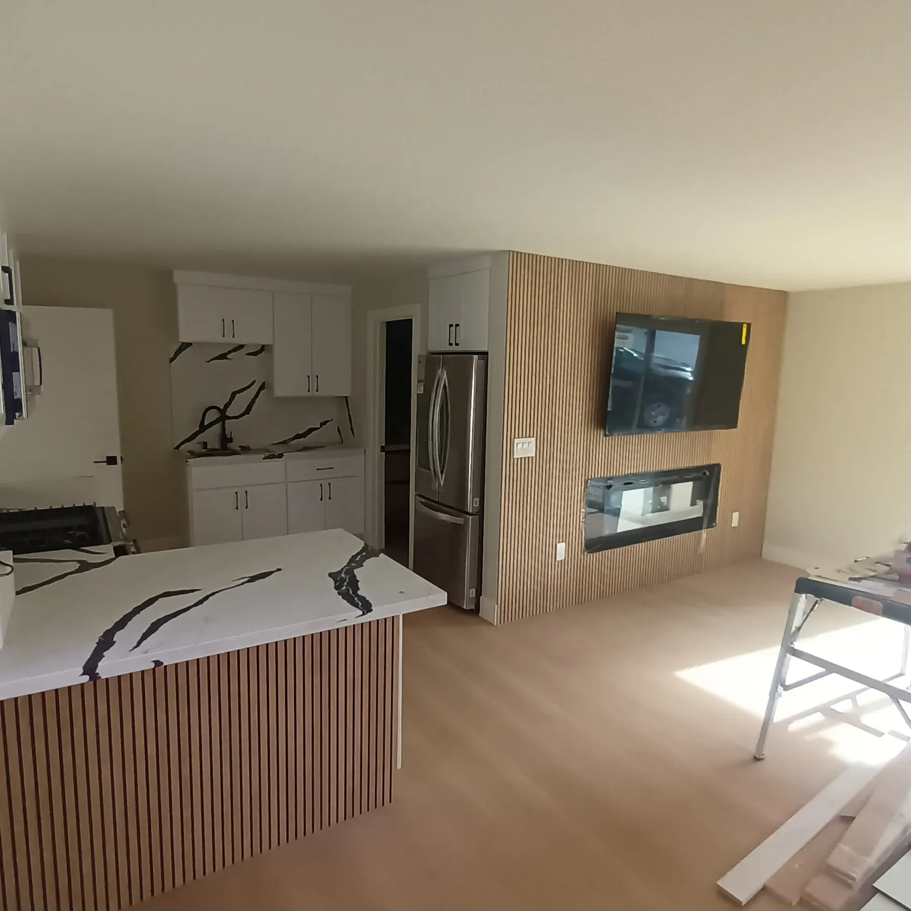 Interior painting in San Jose, CA: freshly painted kitchen and living area